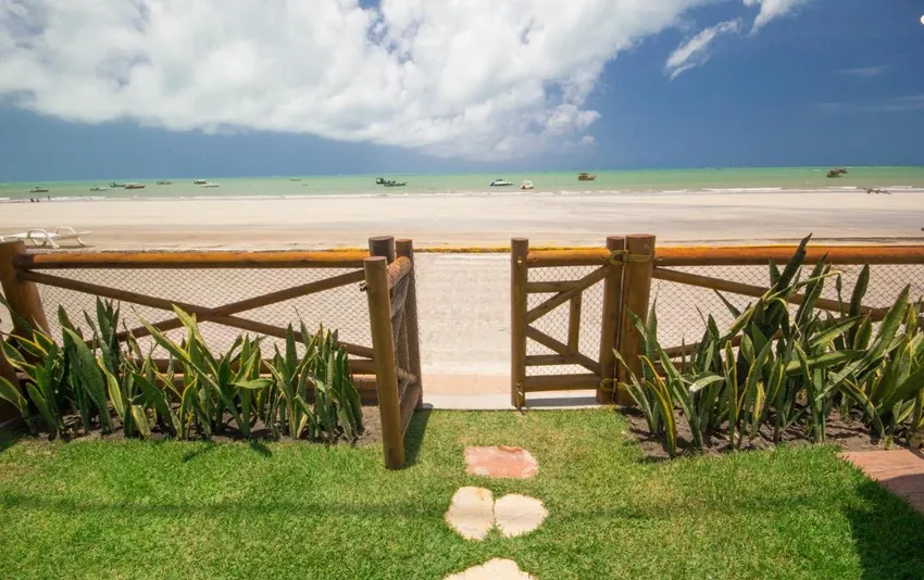 Foto da entrada para a praia